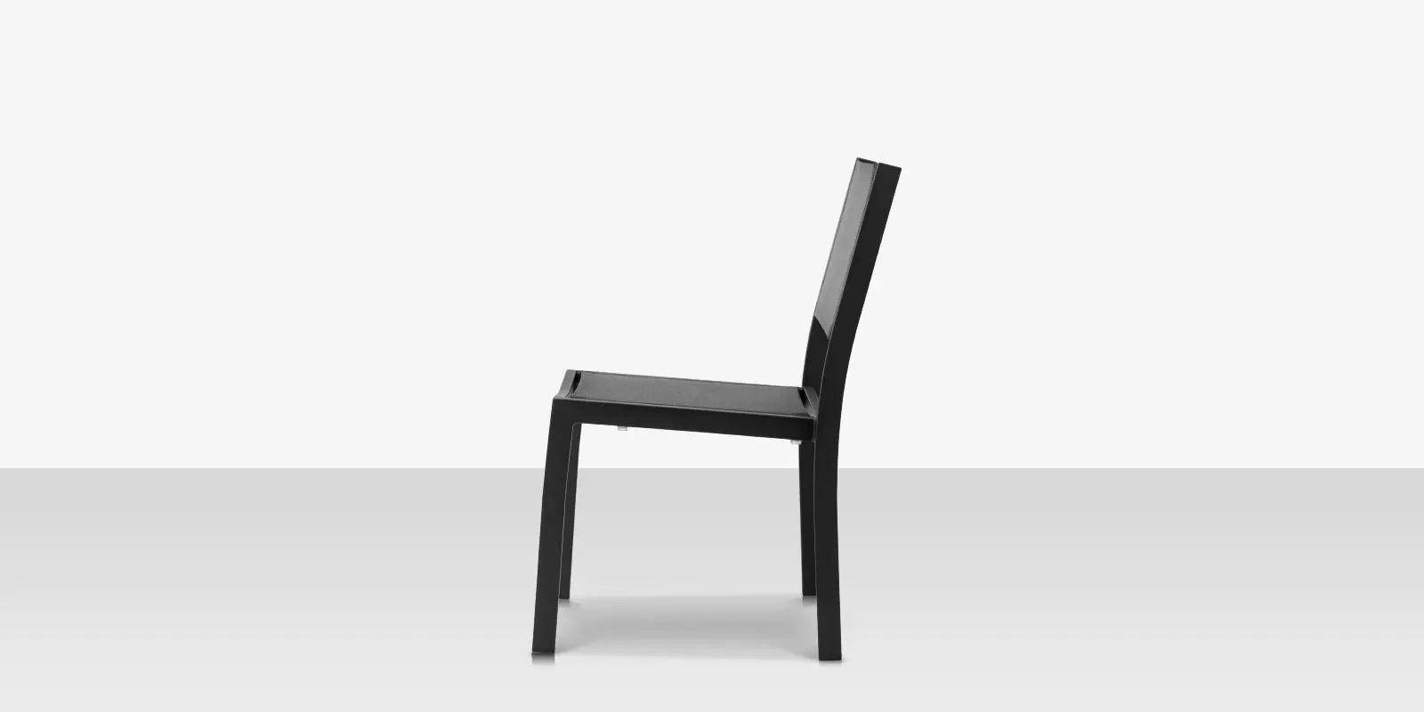 fusion_dining_side_armless_chair_black_side.webp