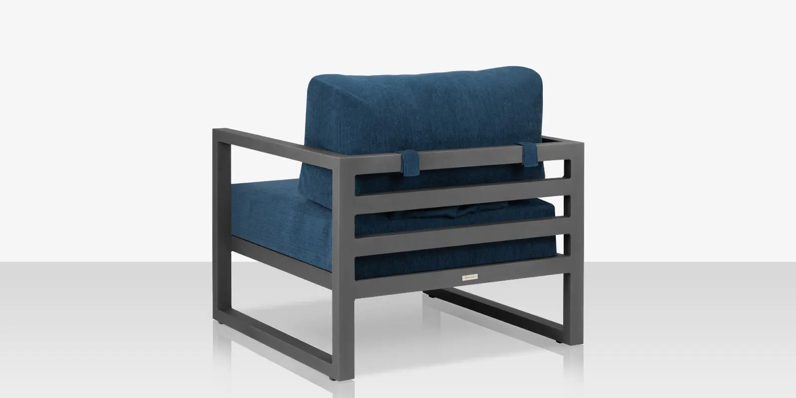 11_iconic_club_chair_silver_blue_back_angle.webp