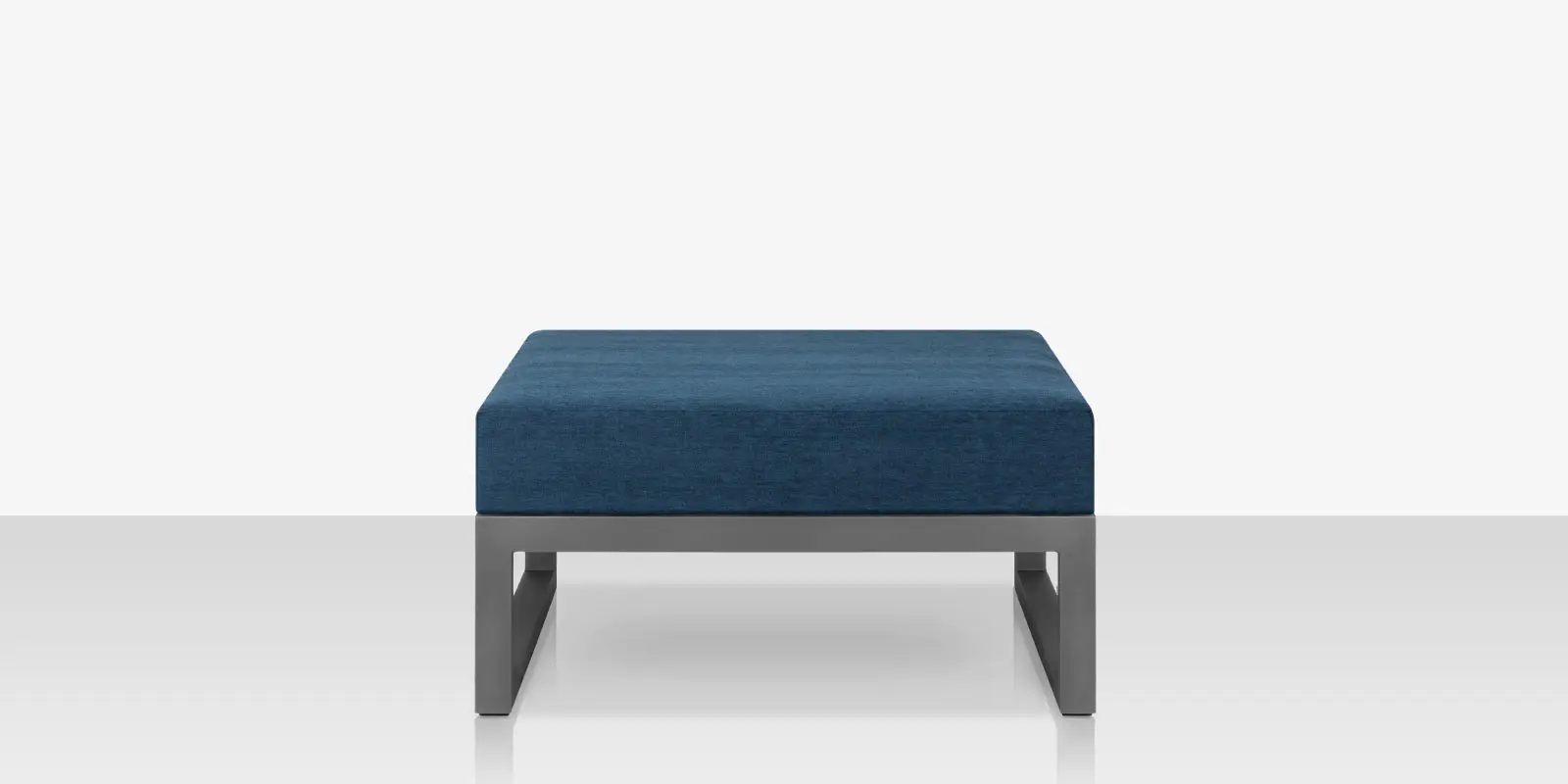 01_iconic_silver_blue_ottoman_front.webp
