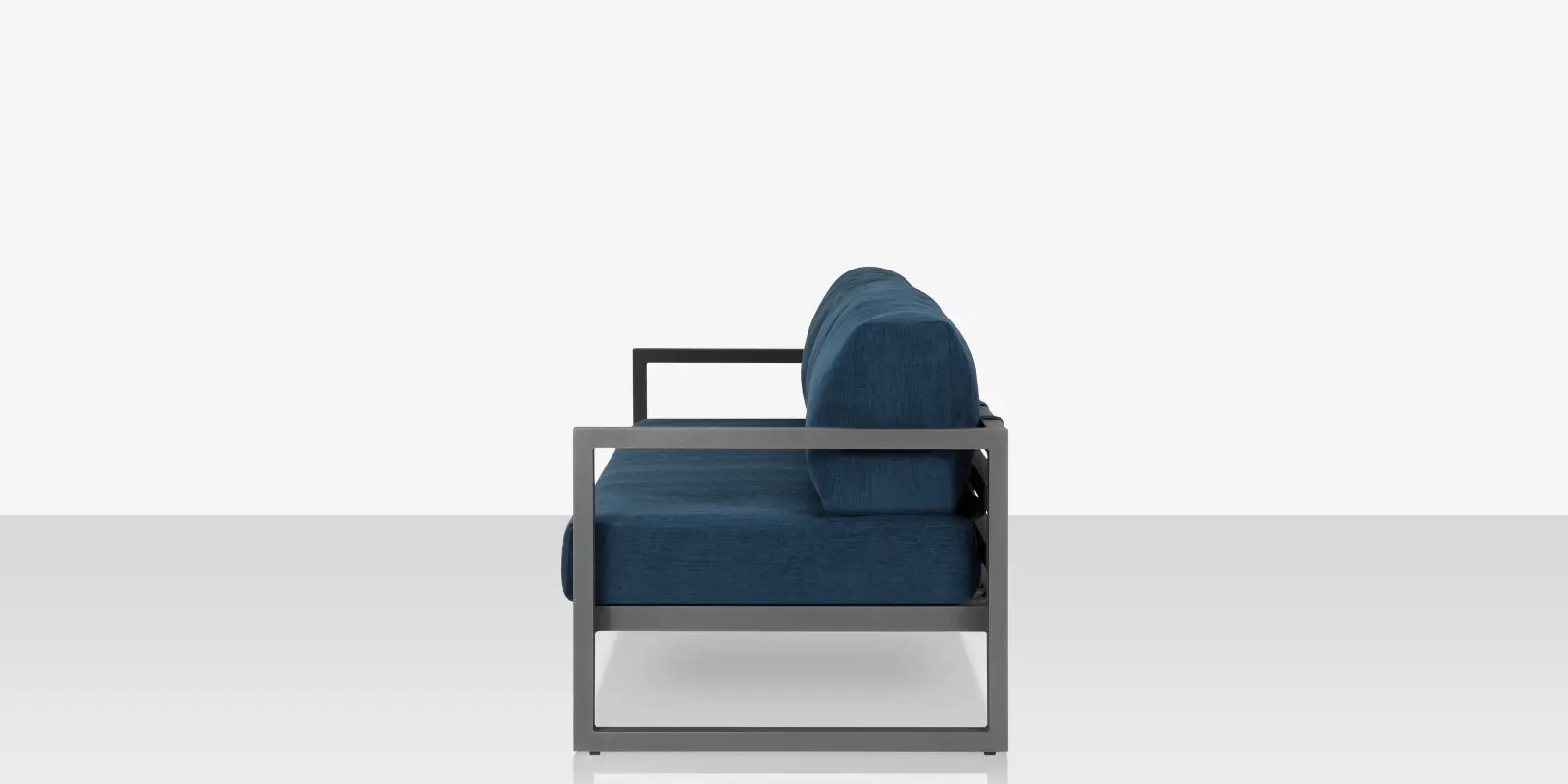 10_iconic_silver_blue_sofa_side.webp