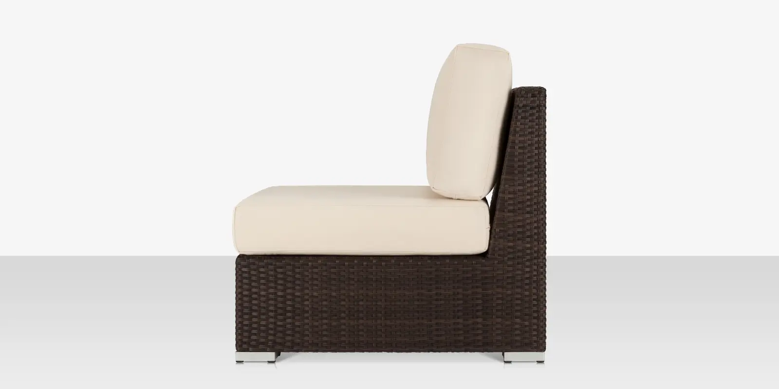 lucaya_armless_chair_duraweave_side.webp