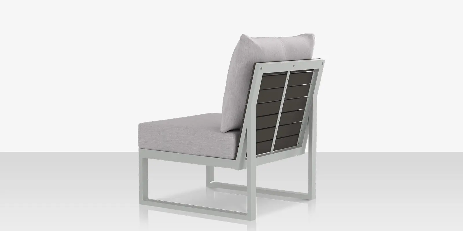 05_modera_new_lounge_chair_armless_back_angle.webp