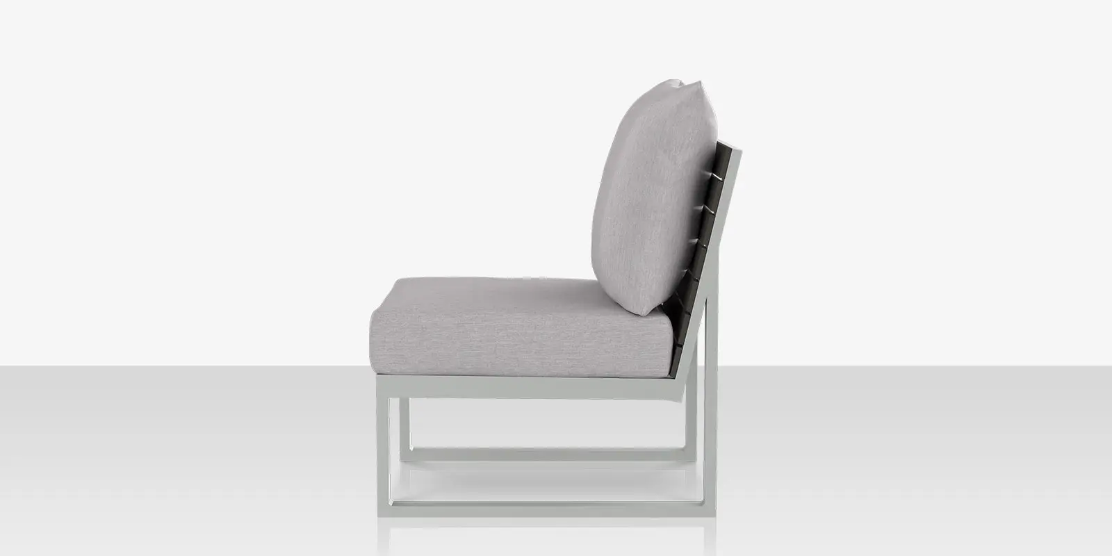 04_modera_new_lounge_chair_armless_side.webp