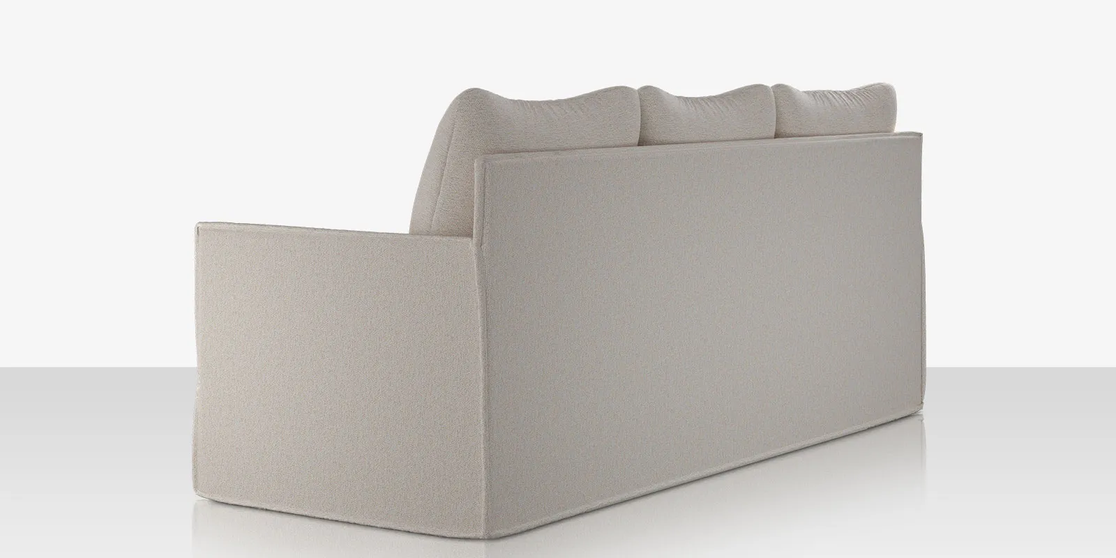 luna_sofa_stucco_back_angle.webp